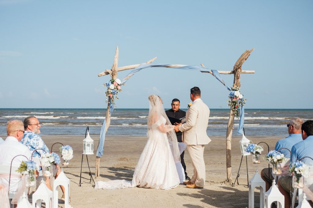 Beach Wedding Rustic Arch Surf in the back ground